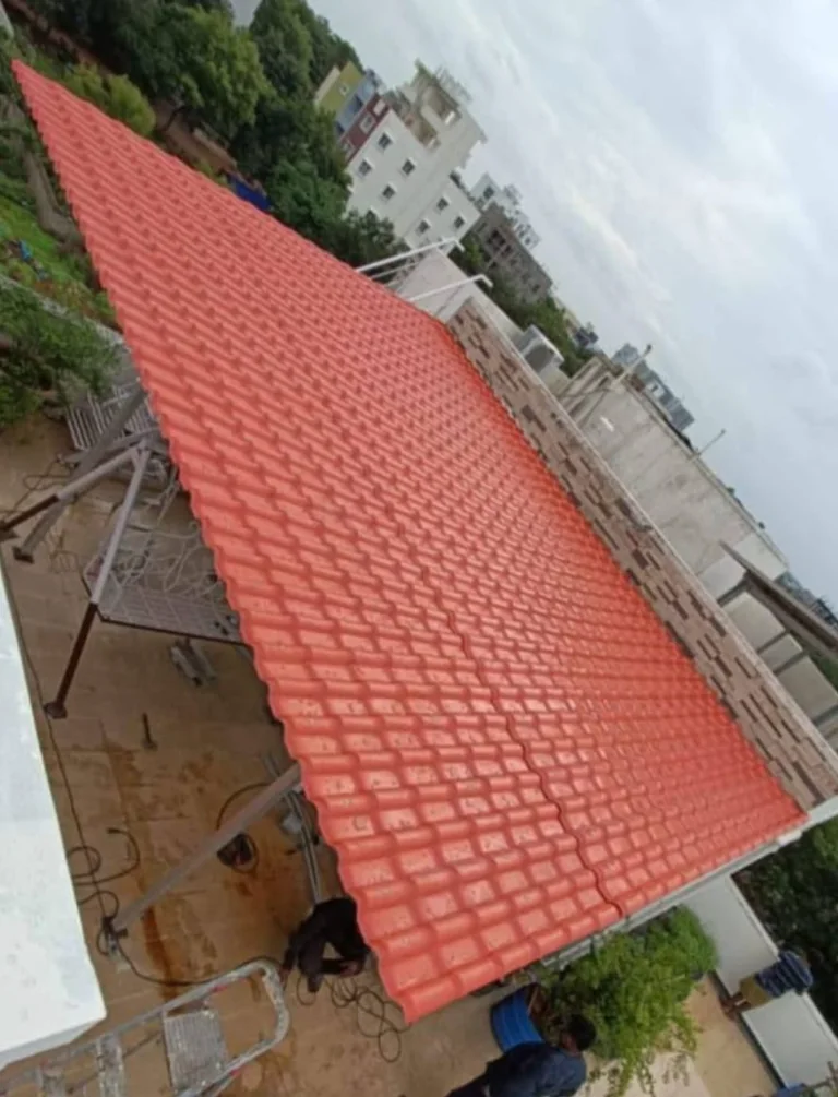 Red Dumuzas roofing installed on a residential home