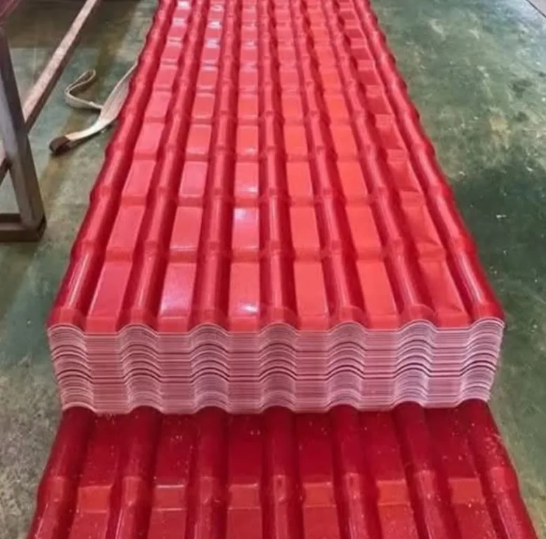 Stack of red Dumuzas roofing sheets with tile profile